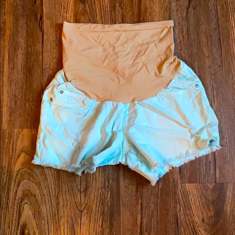 Maternity over the bump distressed denim shorts
